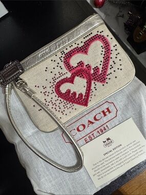 Coach 2010 limited edition poppy crystal heart wristlet